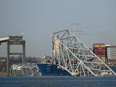 Containers being removed from ship that struck Baltimore bridge