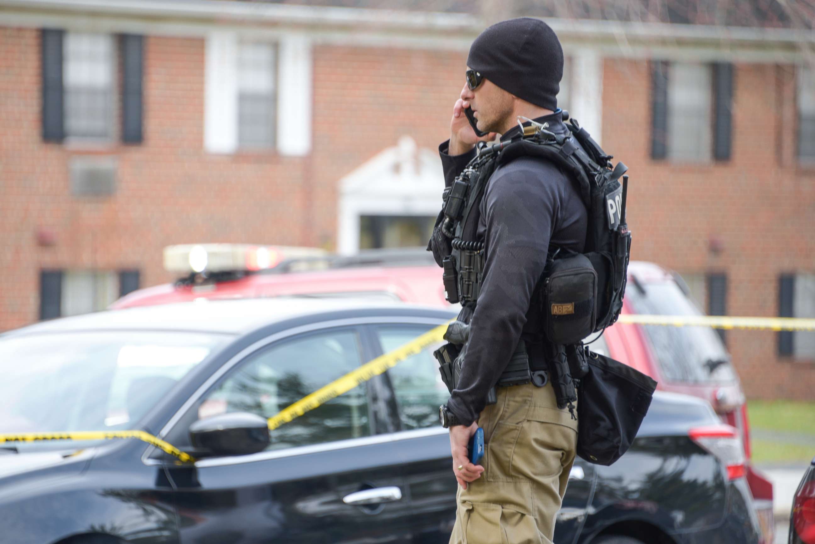 PHOTO: Law enforcement personnel work at the scene of a shooting, Wednesday, Feb. 12, 2020, in Baltimore. Two law enforcement officers with a fugitive task force were injured and a suspect died in the shooting, the U.S. Marshals Service said.