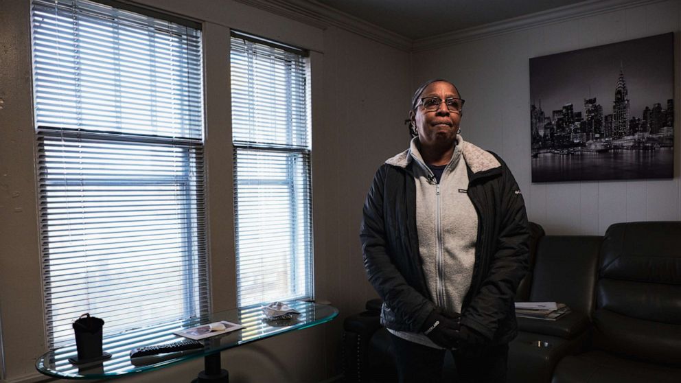 PHOTO: Barbara Massey Mapps stands in the living room of her sister Katherine "Kat" Massey's home in Buffalo, New York. Her sister was among 10 Black people killed in a racially motivated mass shooting at a Buffalo supermarket on May 14, 2022.