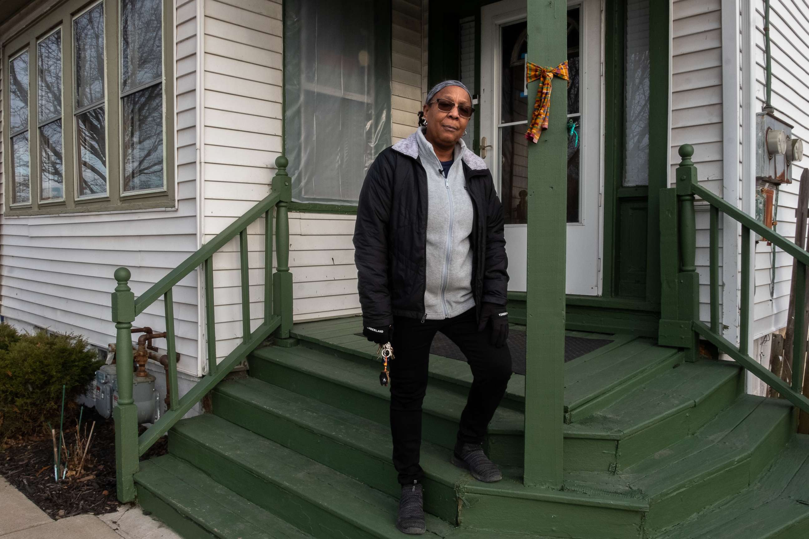 PHOTO: Barbara Massey Mapps stands on the porch of her sister Katherine "Kat" Massey's home in Buffalo, New York. Her sister was among 10 Black people killed in a racially motivated mass shooting at a Buffalo supermarket on May 14, 2022.