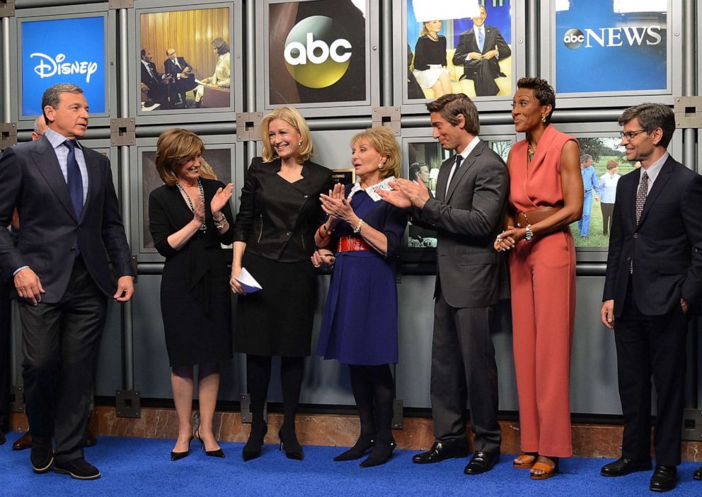 PHOTO: Disney and ABC Television executives and ABC News anchors join Barbara Walters at the dedication ceremony as ABC News headquarters in New York is proclaimed The Barbara Walters Building on May 12, 2014.