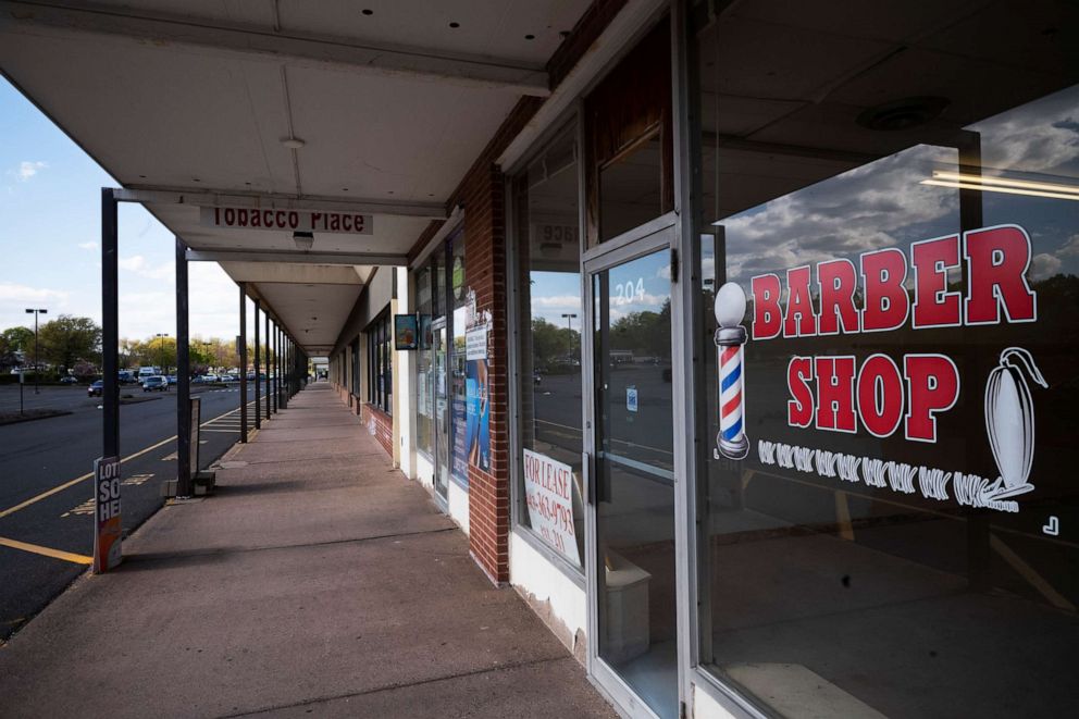 PHOTO: A barbershop has gone out of business and the space is for lease in the Pennywise Shopping Center in Wethersfield, Connecticut, on May 7, 2020.