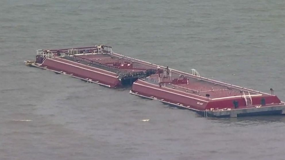 PHOTO: One barge carrying reformate, a gasoline product, capsized and another was nearly sliced in half in a collision with an oil tanker near Houston on Friday, May 10, 2019.