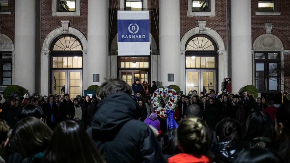 PHOTO: Students gather at the entrance of Barnard College in New York City during a vigil held for slain 18-year-old Tessa Majors on Dec. 12, 2019,
