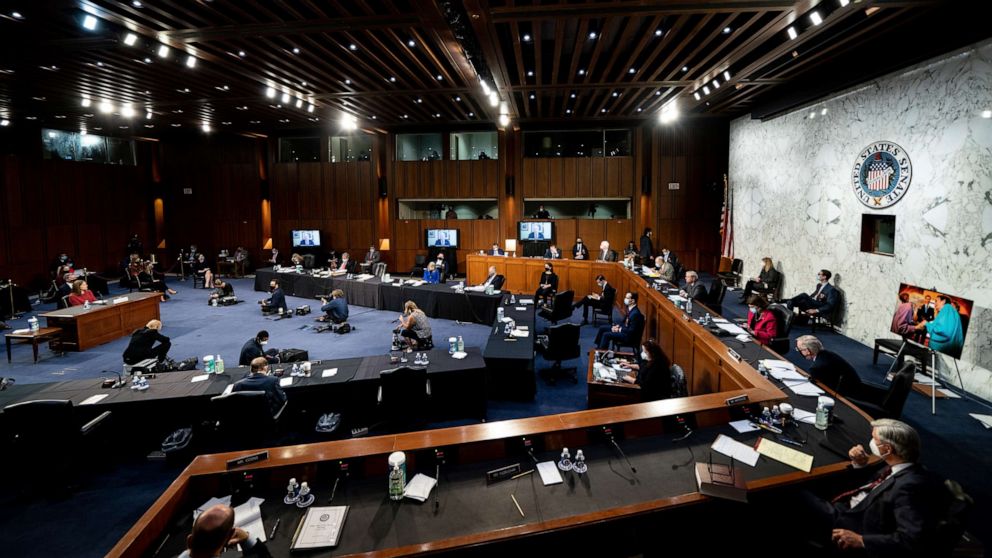 PHOTO: Supreme Court nominee Amy Coney Barrett listens during a confirmation hearing before the Senate Judiciary Committee, Oct. 13, 2020, on Capitol Hill in Washington.