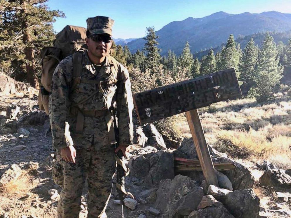 PHOTO: Pfc. Christian Bautista stands at a trail summit while participating in a unit hike at the Mountain Warfare Training Center in Bridgeport, Calif in this undated file photo.