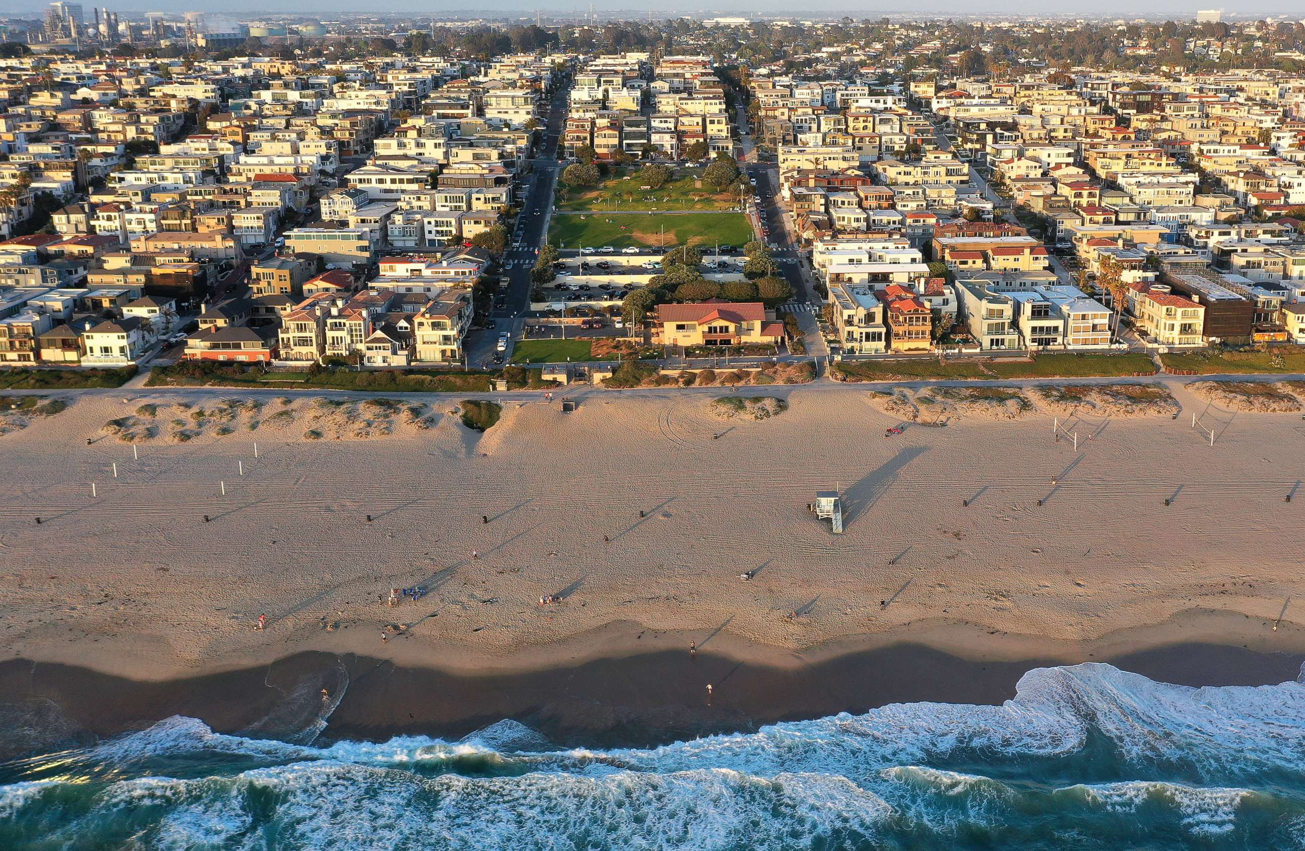 PHOTO: In an aerial view, Bruce's Beach (C) is wedged between expensive real estate, April 19, 2021, in Manhattan Beach, Calif. 