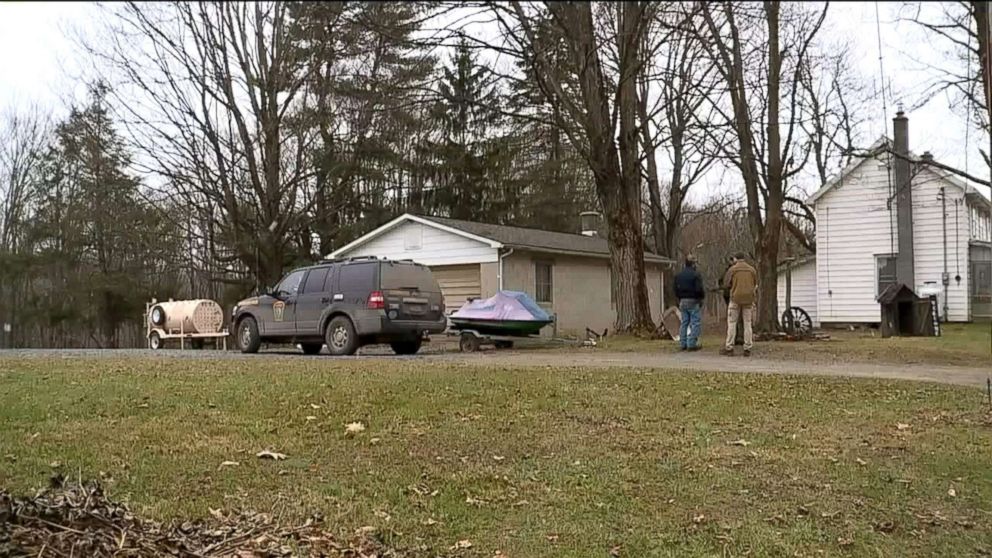 PHOTO: Game wardens search for a bear that attacked a woman and dragged her 88 yards in her front yard.