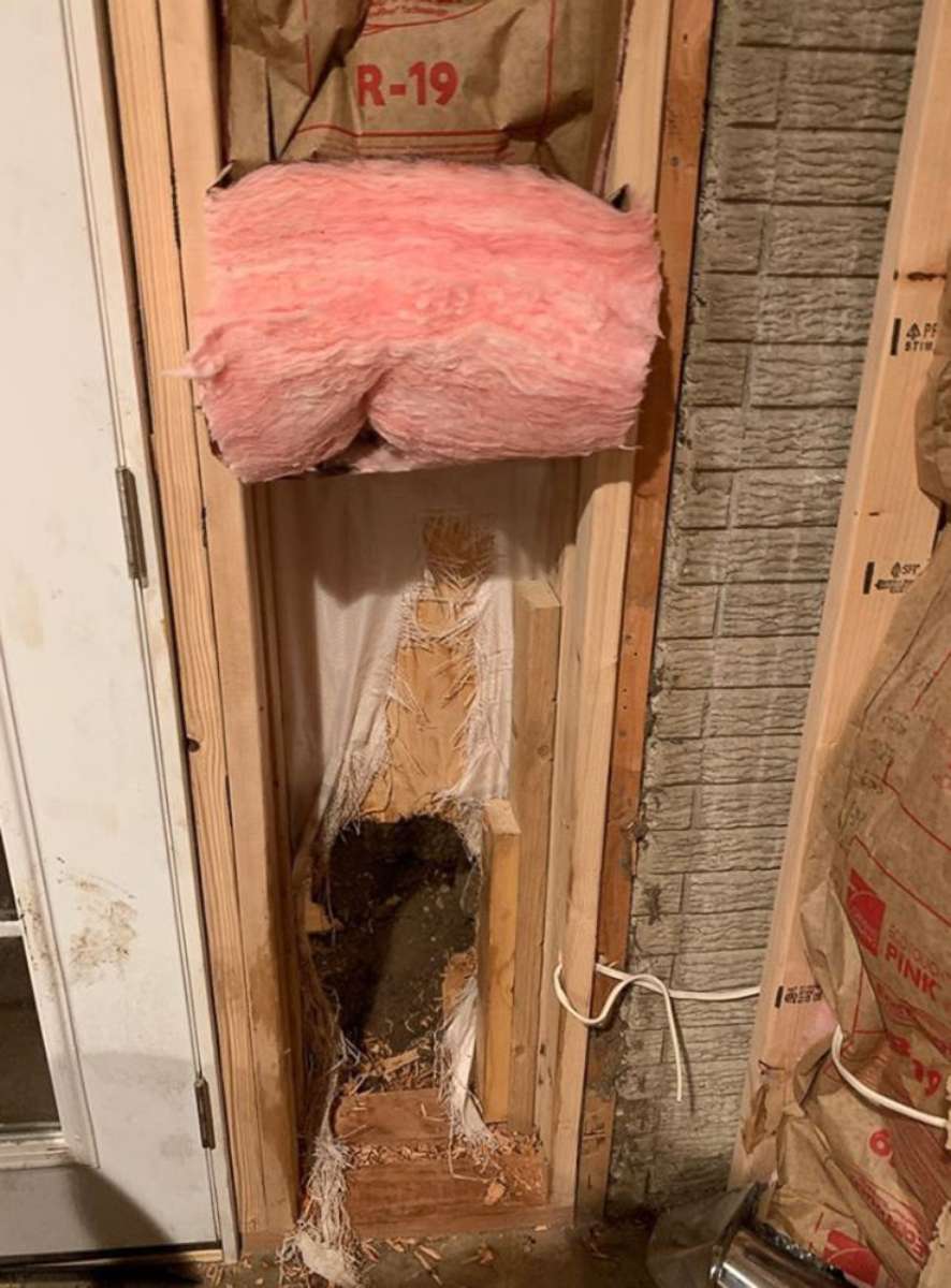 PHOTO: This image, posted to the Estes Park Police Department Facebook page on August 10, 2019, shows the hole where a bear broke into a house in Estes Park, Colorado.