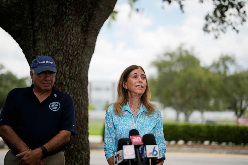 PHOTO: Linda Beigel Schulman, mother of Scott Beigel, is overcome with emotion as she talks to journalists about visiting the scene where her son and 16 others were killed, at Marjory Stoneman Douglas High School in Parkland, Fla., July 5, 2023.