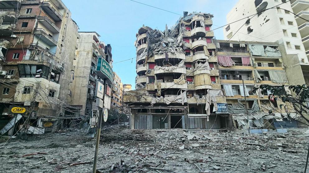 PHOTO: Debris is scattered in a street in front of damaged buildings, in the aftermath of Israeli airstrikes that targeted the neighbourhood of Haret Hreik in Beirut's southern suburbs, on Nov. 16, 2024.