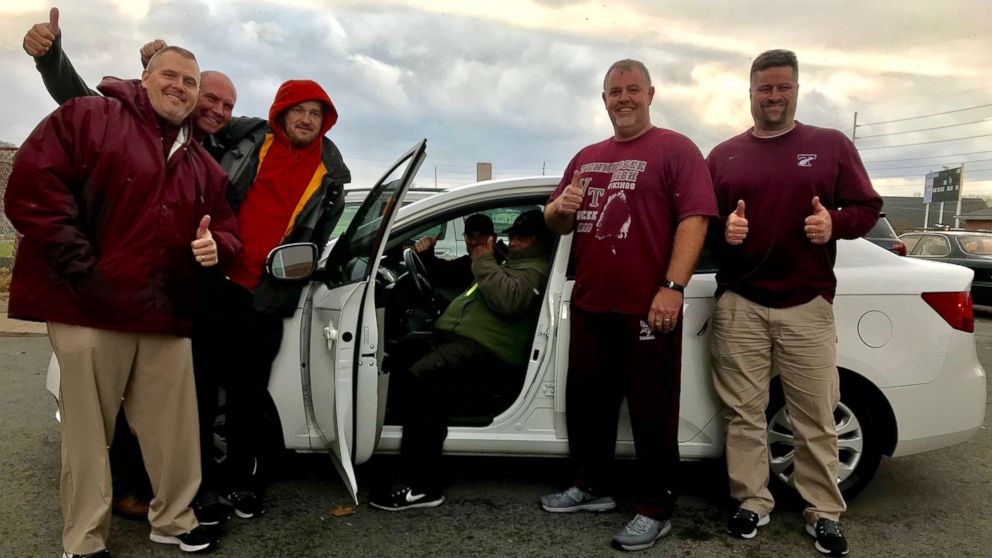 VIDEO: Volunteer football coach receives new car as thank-you for his service