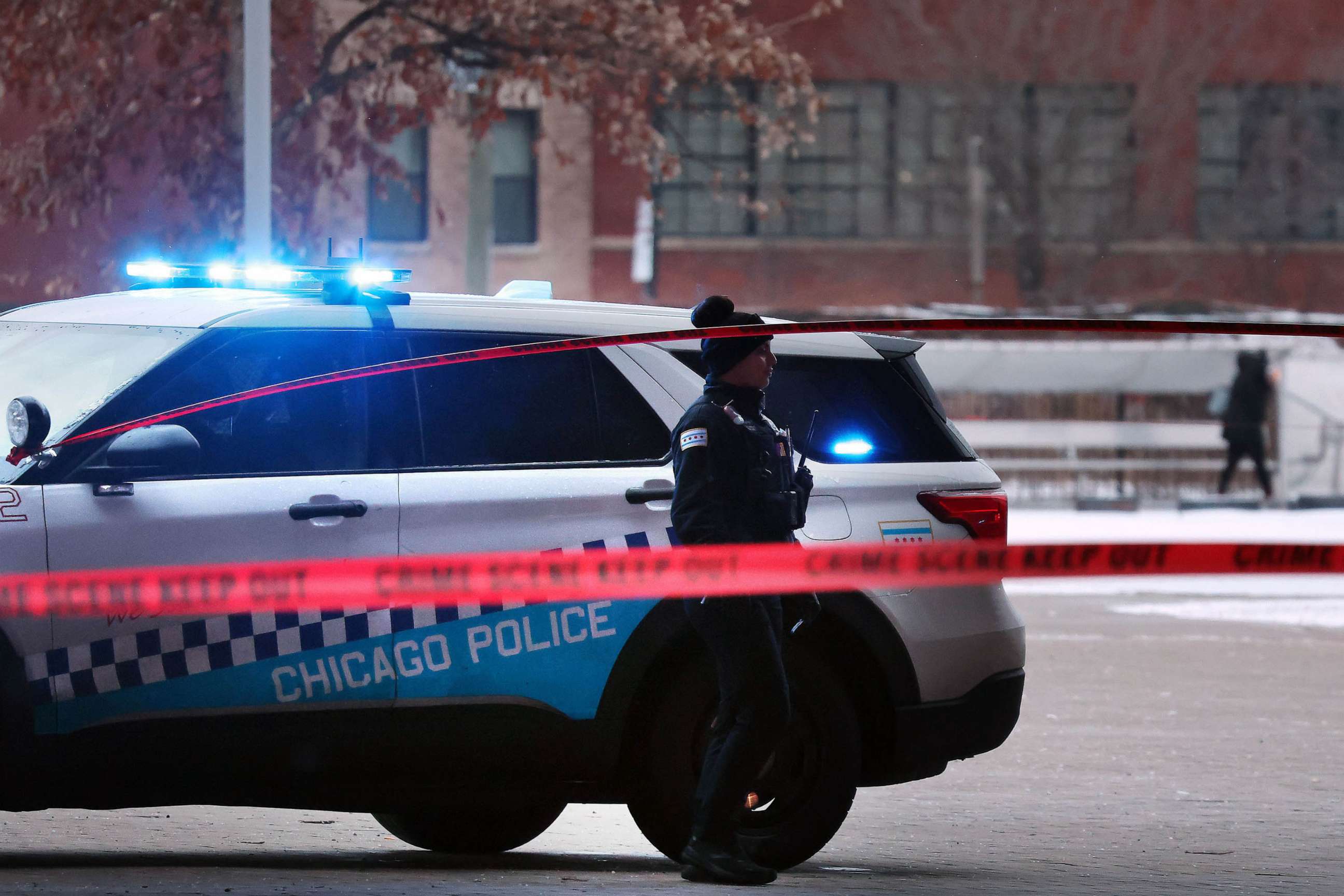 PHOTO: Chicago police secure a crime scene on the campus of Benito Juarez Community Academy high school in Chicago where four people were shot after school, Dec. 16, 2022.