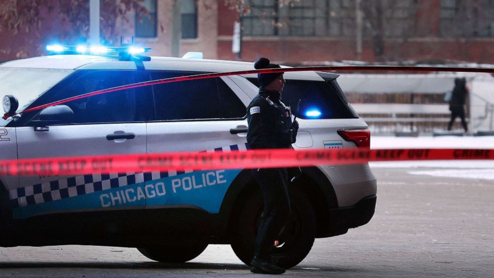 PHOTO: Chicago police secure a crime scene on the campus of Benito Juarez Community Academy high school in Chicago where four people were shot after school, Dec. 16, 2022.