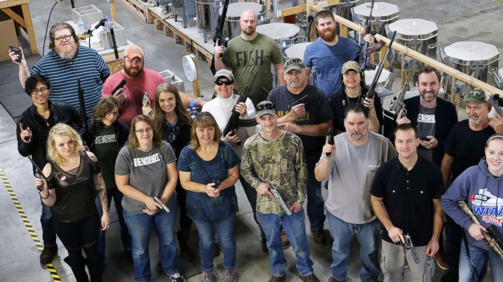 PHOTO: Employees at BenShot in Wisconsin pose with firearms on Nov. 6, 2018.