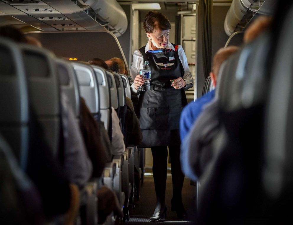 PHOTO: In this Nov. 9, 2017, file photo, American Airlines Flight Attendant Bette Nash checks on her passengers en route from Boston to DCA.