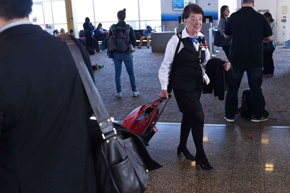 PHOTO: In this Dec. 19, 2017, file photo, American Airlines longest serving flight attendant, Bette Nash, 81 years old, walks in the airport after disembarking from her daily return flight to Boston at Ronald Reagan Washington Airport in Arlington, Va.