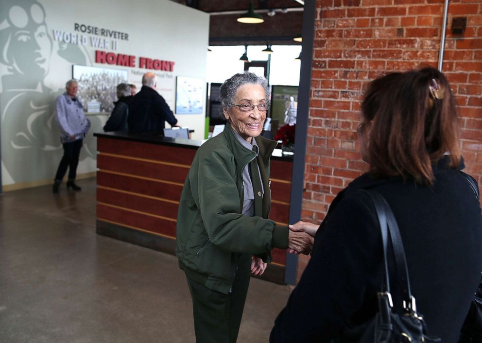 PHOTO: National Park Service ranger Betty Reid Soskin greets a visitor at the Rosie the Riveter/World War II Home Front National Historical Park on Oct. 24, 2013 in Richmond, Calif.