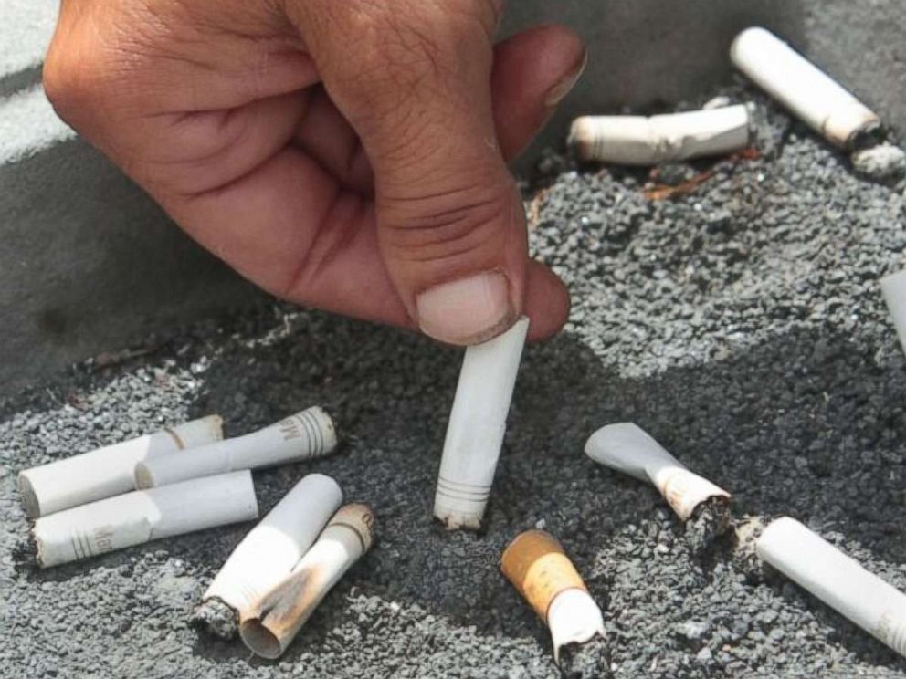 PHOTO: A smoker snuffs out a cigarette at the Capitol in Sacramento, Calif., June 22, 2012.