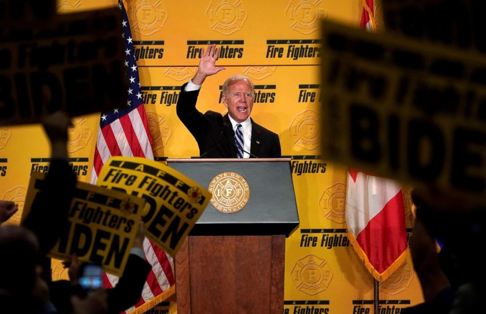 PHOTO: Supporters hold up signs as former Vice President Joe Biden finishes his speech to the International Association of Fire Fighters in Washington D.C., March 12, 2019. 