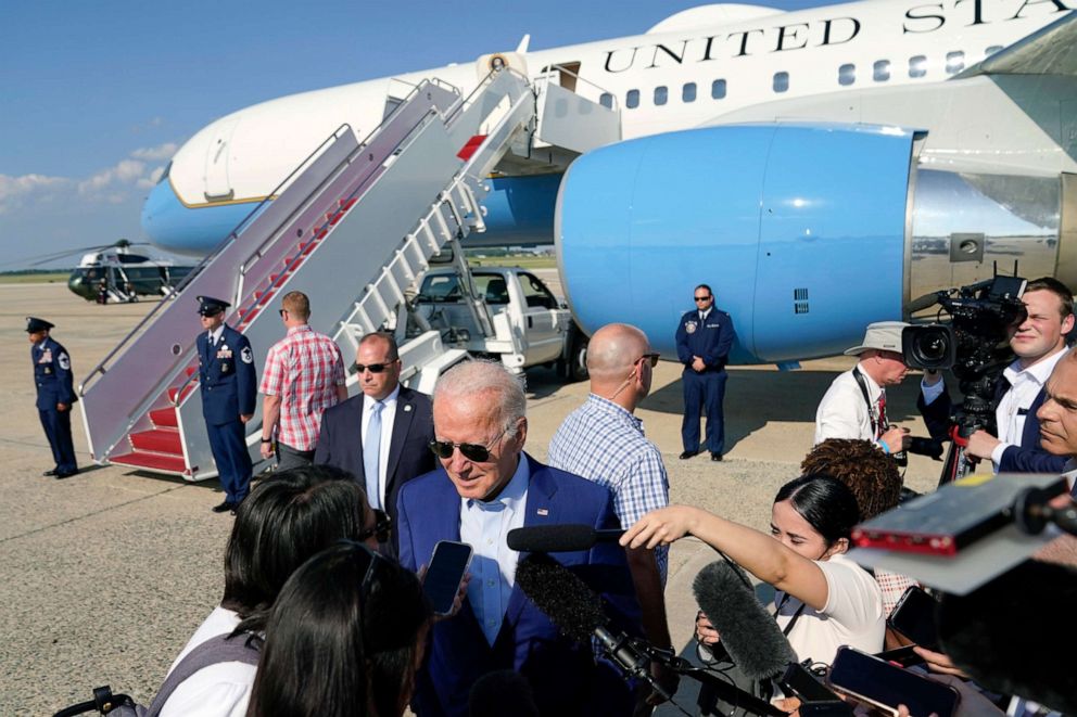 PHOTO: President Joe Biden speaks to members of the media after exiting Air Force One, July 20, 2022, at Andrews Air Force Base, Md.