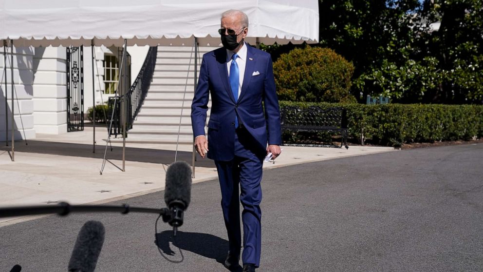PHOTO: President Joe Biden walks towards the members of the media before walking to board Marine One on the South Lawn of the White House, March 26, 2021.