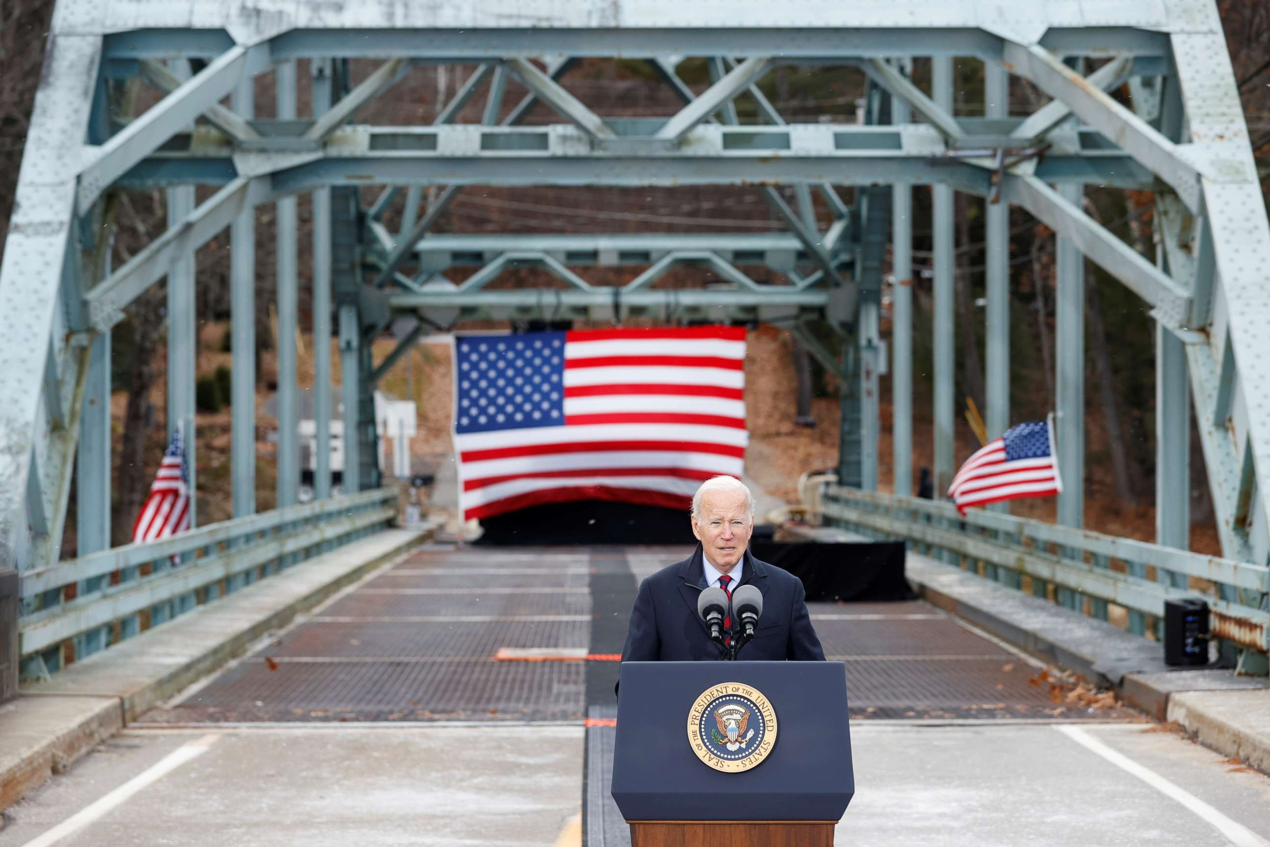 PHOTO: President Joe Biden delivers remarks on infrastructure construction projects from the NH 175 bridge across the Pemigewasset River in Woodstock, New Hampshire, Nov. 16, 2021.