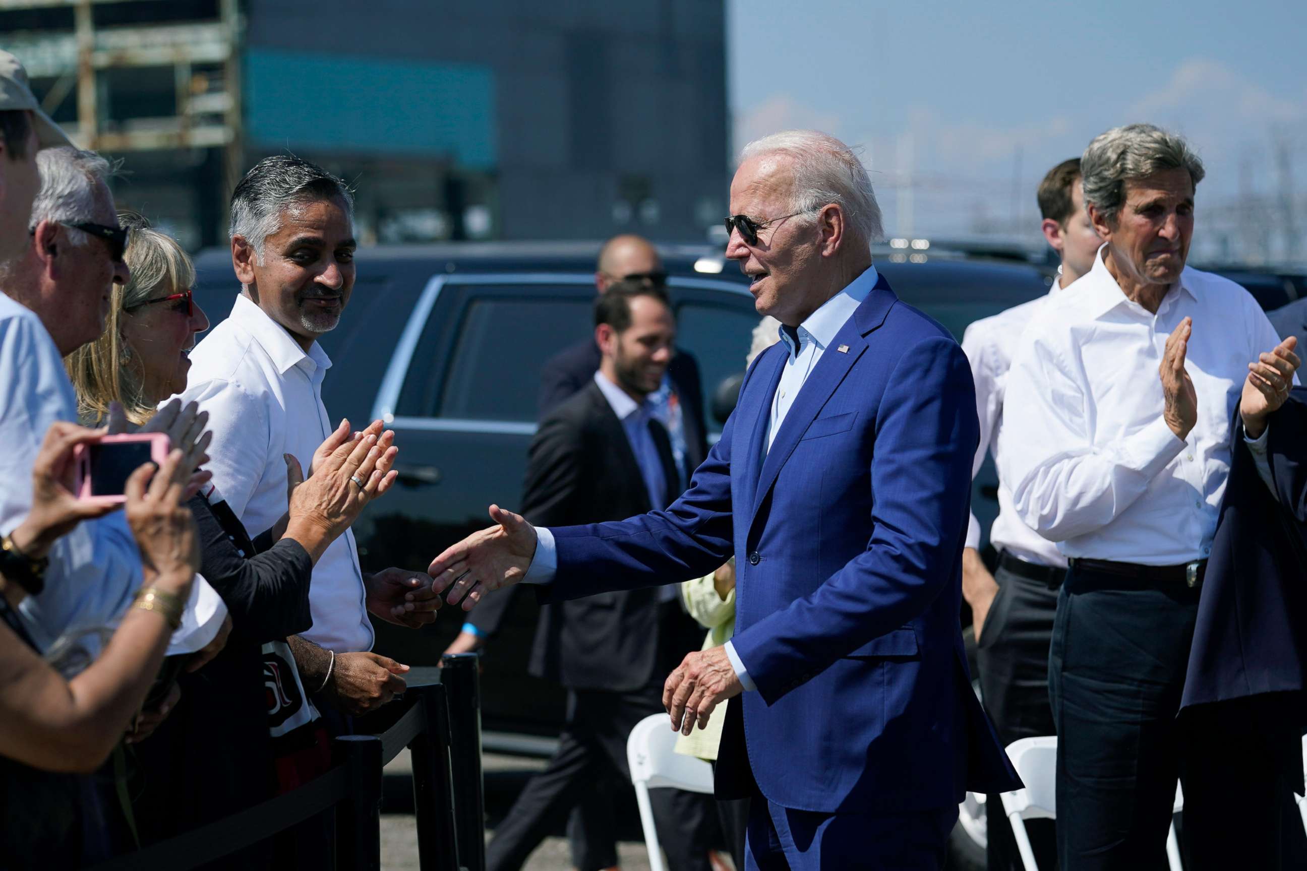 PHOTO: President Joe Biden greets people after speaking about climate change and clean energy at Brayton Power Station, July 20, 2022, in Somerset, Mass.