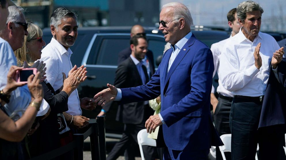 PHOTO: President Joe Biden greets people after speaking about climate change and clean energy at Brayton Power Station, July 20, 2022, in Somerset, Mass.