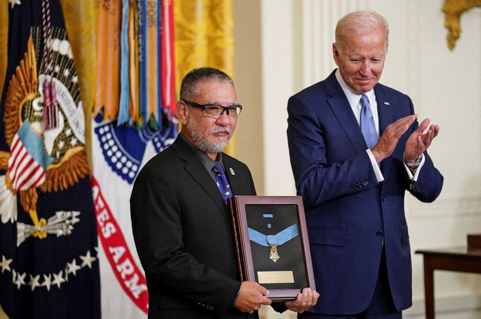 PHOTO: President Joe Biden presents the Medal of Honor to John Kaneshiro in posthumous memory of his father U.S. Army veteran Staff Sergeant Edward Kaneshiro, who fought in the Vietnam War, during a White House ceremony in Washington, D.C., July 5, 2022. 