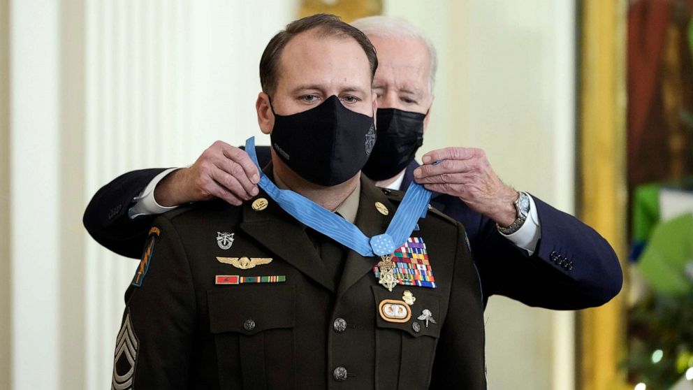 PHOTO: President Joe Biden awards the Medal of Honor to Army Master Sgt. Earl Plumlee in the East Room of the White House, on Dec. 16, 2021, in Washington, D.C.