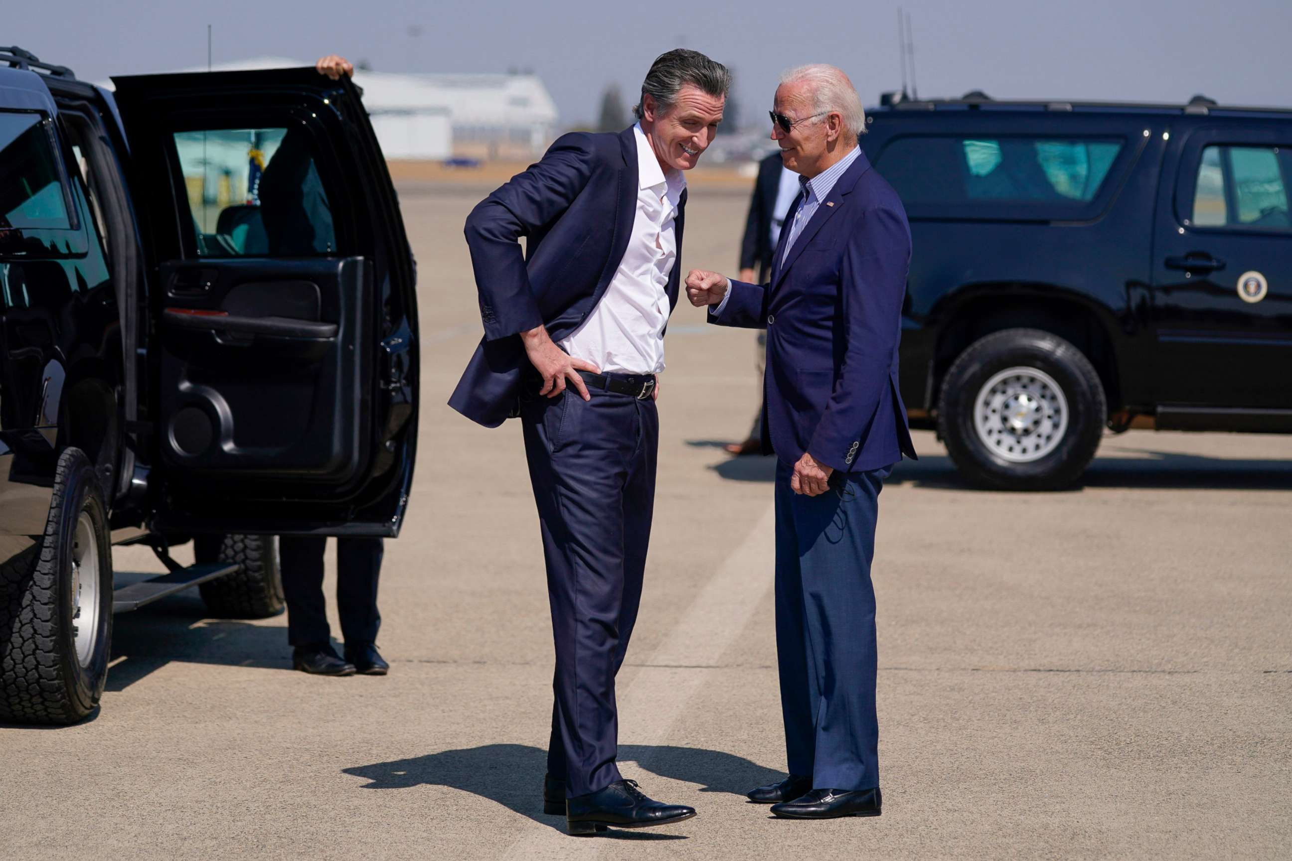 PHOTO: President Joe Biden talks with California Gov. Gavin Newsom as he arrives at Mather Airport on Air Force One, Sept. 13, 2021, in Mather, Calif.