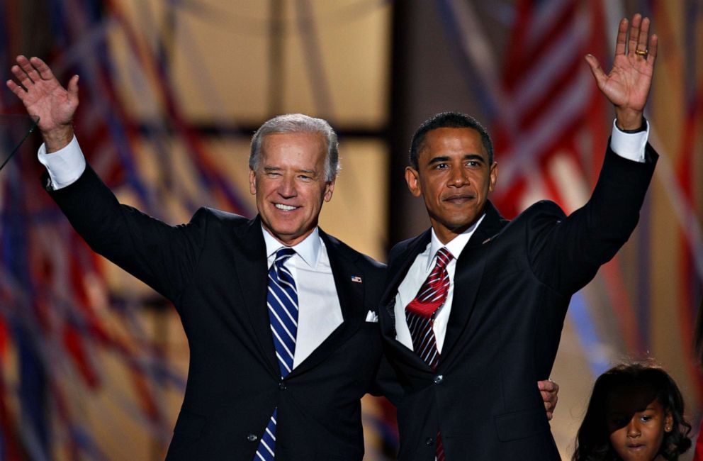 PHOTO: Senator Barack Obama, democratic presidential candidate, and Senator Joe Biden, vice presidential candidate, acknowledge the crowd on day four of the 2008 Democratic National Convention (DNC) in Denver, Colorado, Aug. 28, 2008.