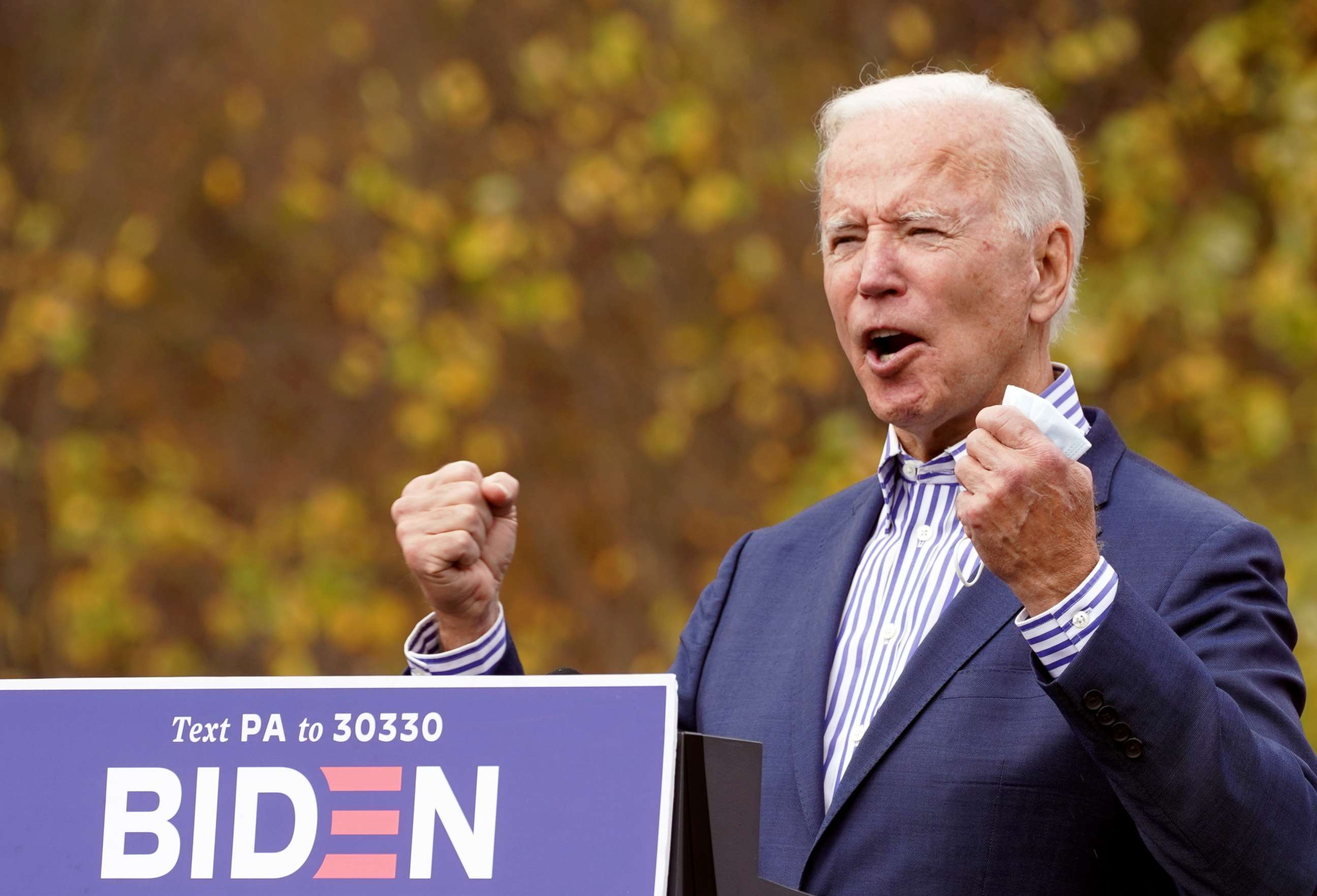 PHOTO: Democratic presidential candidate Joe Biden speaks during a drive-in campaign event at Bucks County Community College in Bristol, Pa. Oct. 24, 2020.