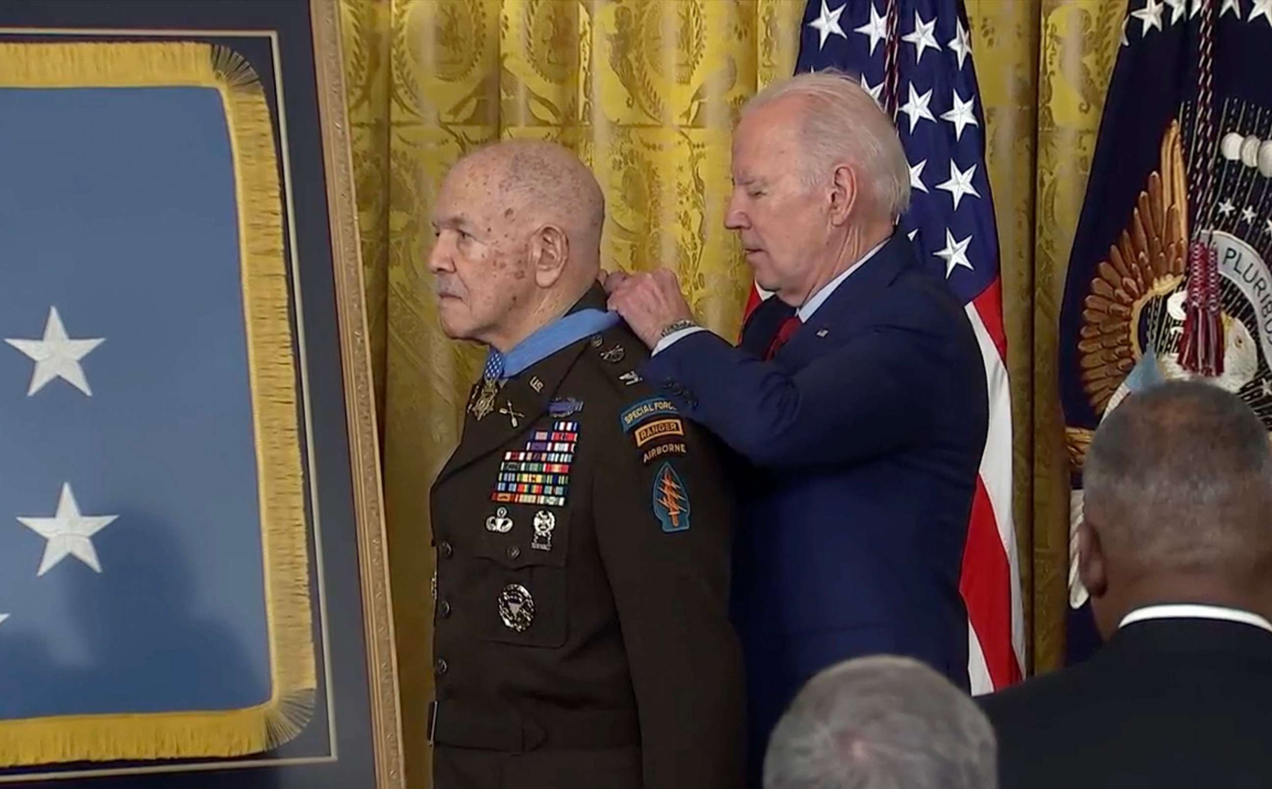 PHOTO: President Joe Biden stands with Vietnam War veteran, Retired US Army Colonel Paris Davis, before awarding him the Medal of Honor, in the East Room of the White House in Washington, DC, on March 3, 2023.