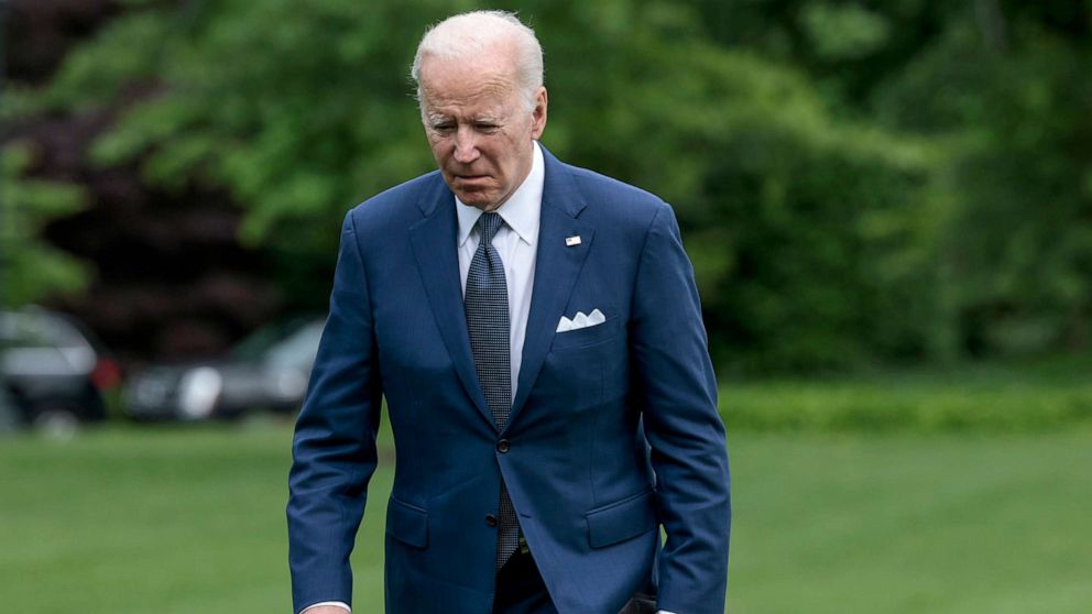 PHOTO: President Joe Biden walks on the South Lawn of the White House after returning from his first trip to Asia as president, May 24, 2022 in Washington, D.C.
