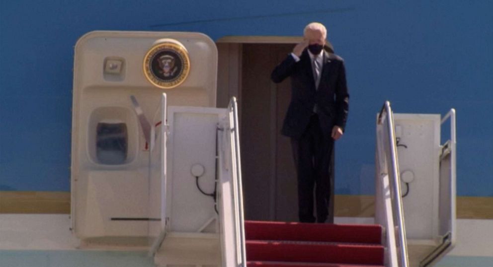 PHOTO: President Joe Biden salutes after walking up the steps of Air Force One at Joint Base Andrews, Md., March 19, 2021, for a trip to Georgia.