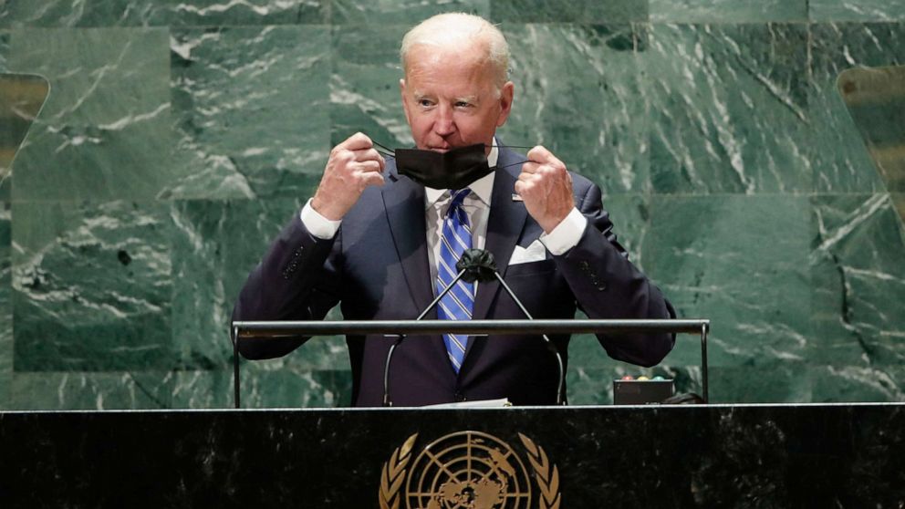 PHOTO: President Joe Biden takes off his protective face mask before speaking at the 76th Session of the UN General Assembly, Sept. 21, 2021, in New York.