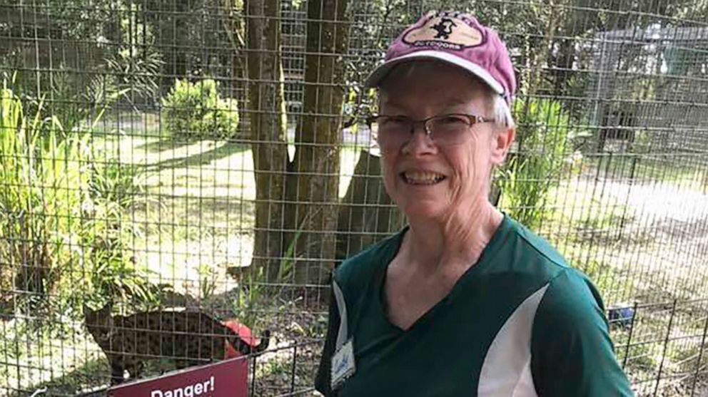 PHOTO: In this 2018 photo provided by Big Cat Rescue, volunteer Candy Couser smiles before feeding big cats at Carole Baskin's Big Cat Rescue sanctuary near Tampa, Fla.