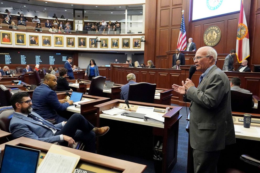 PHOTO: Florida Sen. Dennis Baxley, right, sponsor of a bill, dubbed by opponents as the "Don't Say Gay" bill, speaks right before the bill was voted on during a legislative session at the Florida State Capitol, March 8, 2022, in Tallahassee, Fla.