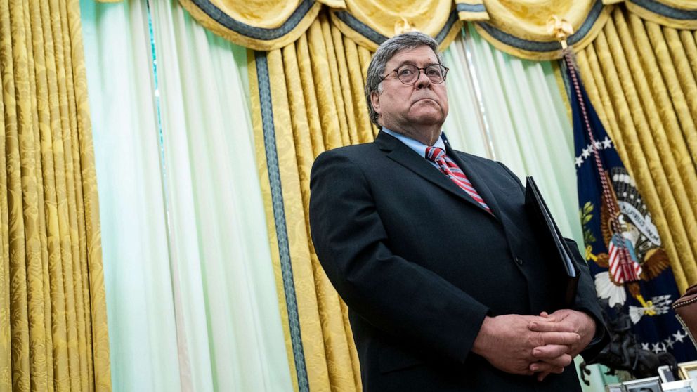 PHOTO: Attorney General William Barr listens as President Donald Trump speaks in the Oval Office before signing an executive order related to regulating social media on May 28, 2020, in Washington, DC.