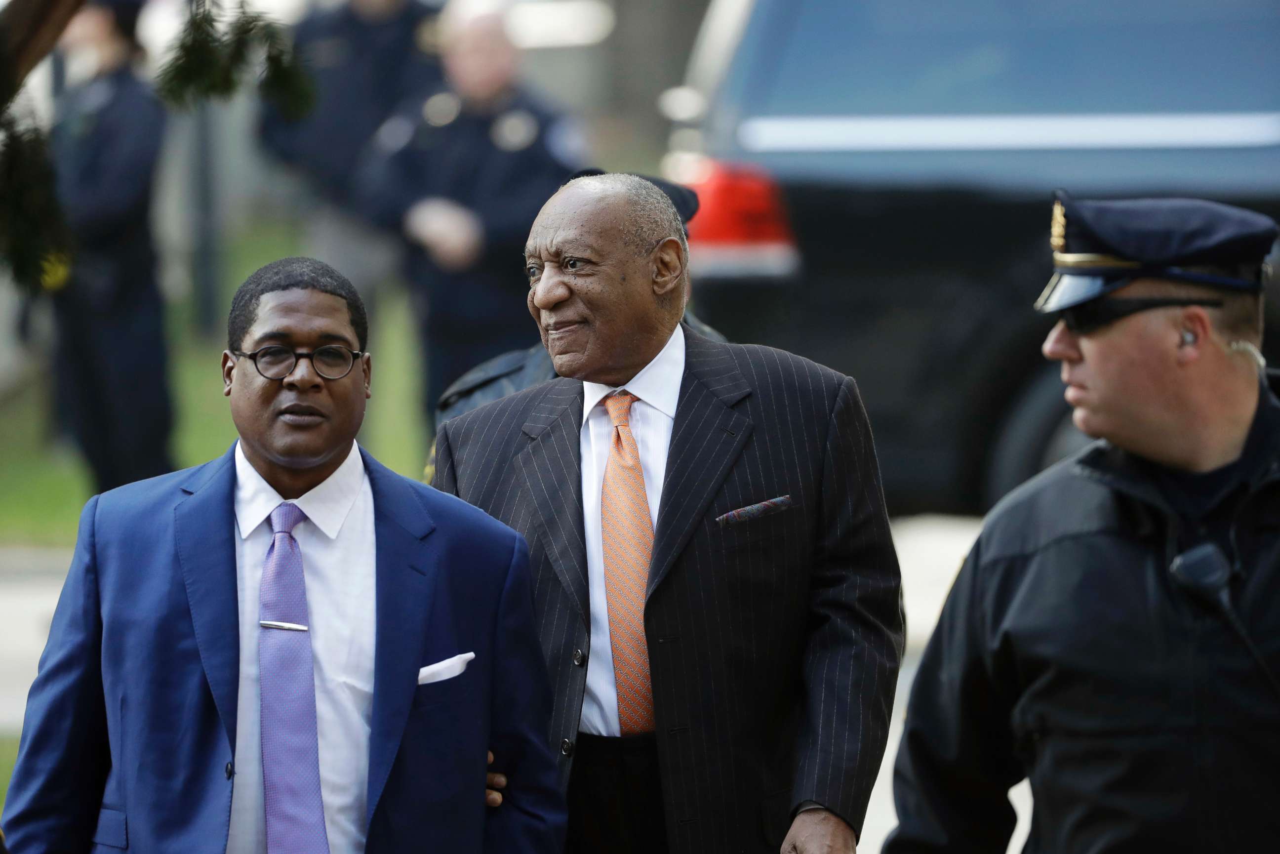PHOTO: Bill Cosby, center, arrives for his sexual assault trial, April 10, 2018, at the Montgomery County Courthouse in Norristown, Pa.
