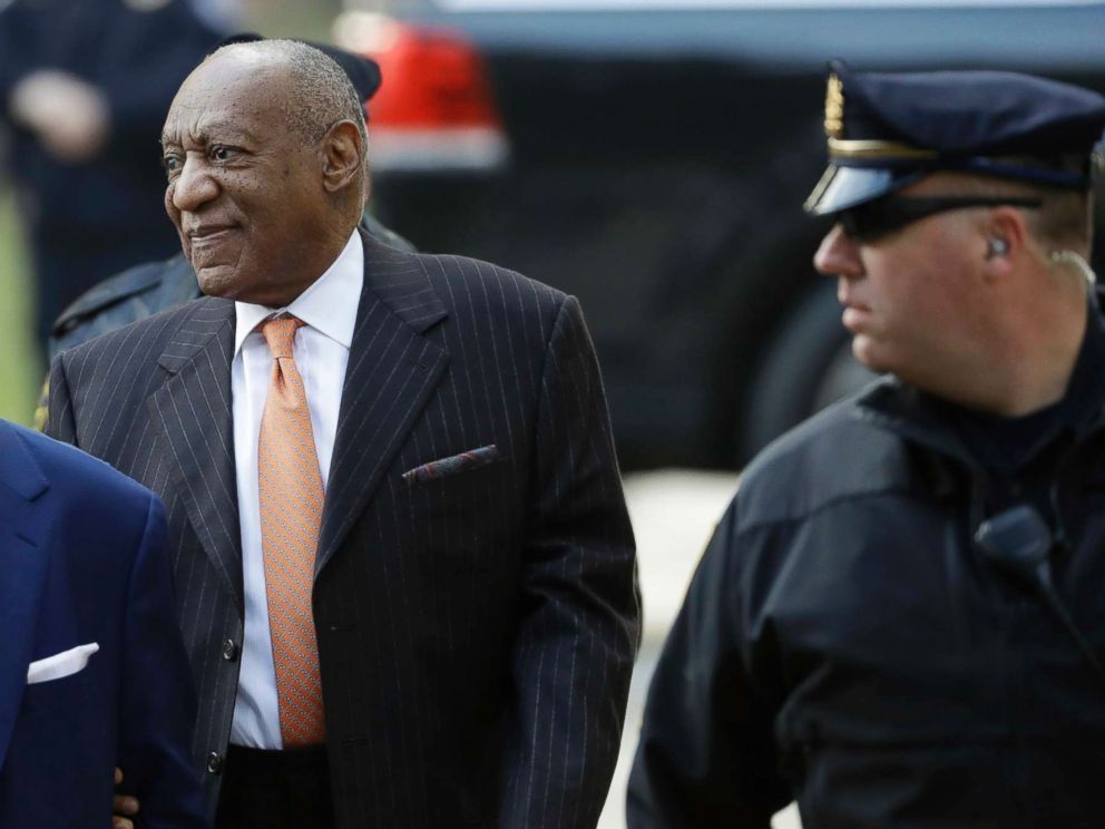 PHOTO: Bill Cosby, center, arrives for his sexual assault trial, April 10, 2018, at the Montgomery County Courthouse in Norristown, Pa.