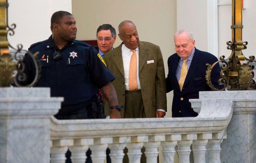 PHOTO: Bill Cosby walks towards the courtroom after a break in the Montgomery County Courthouse on the fourth day of his sexual assault retrial on April 12, 2018 in Norristown, Pa.