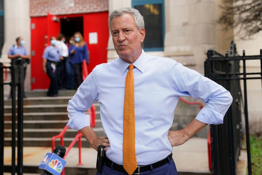 PHOTO: New York Mayor Bill de Blasio speaks to reporters after visiting New Bridges Elementary School in Brooklyn, New York, to observe pandemic-related safety procedures.