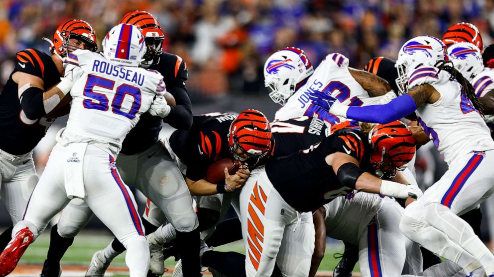 PHOTO: In this Jan. 2, 2023, file photo, Joe Burrow of the Cincinnati Bengals carries the ball during an NFL football game against the Buffalo Bills at Paycor Stadium in Cincinnati, Ohio.