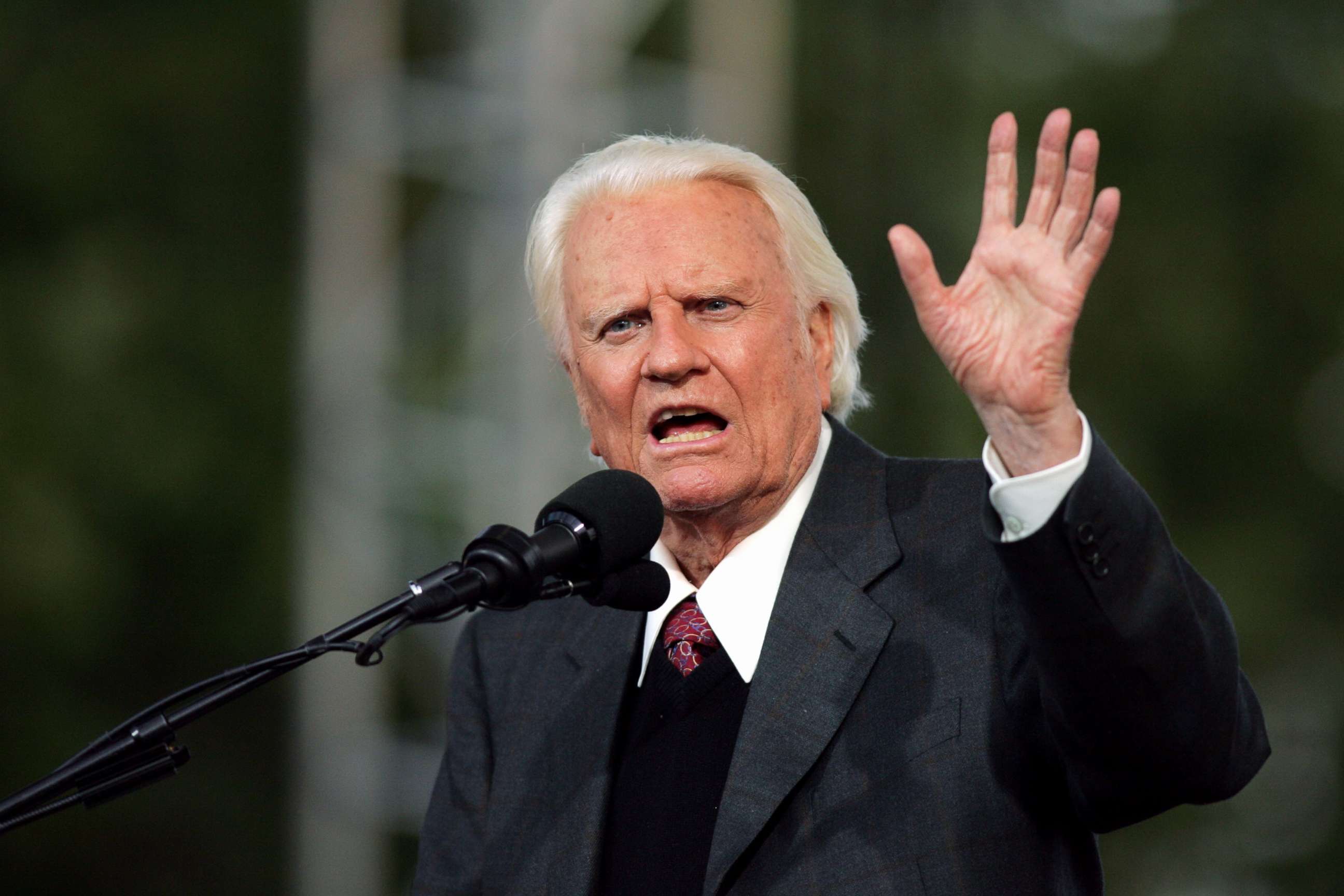 PHOTO: The Rev. Billy Graham, 86, delivers his sermon to a crowd of about 80,000 on the second day of the Greater New York Billy Graham Crusade at Flushing Meadows-Corona Park in Queens, New York, June 25, 2005.