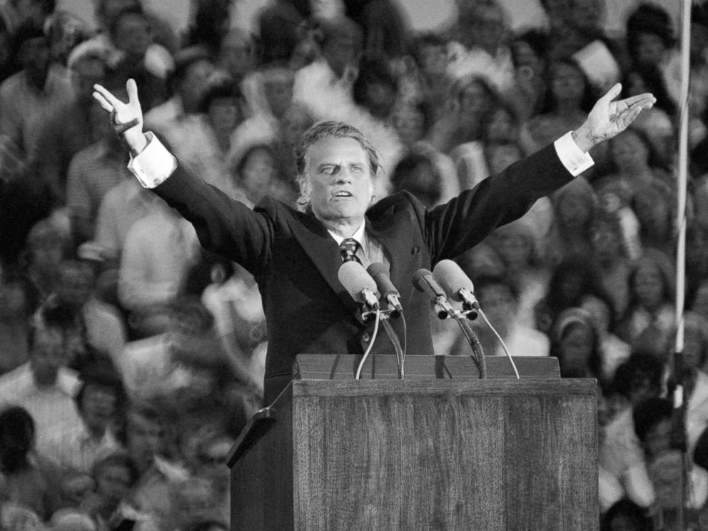 PHOTO: Evangelist Billy Graham preaches to a crowd of 21,000 in St. Paul, Minn., about Judgement Day, July 13, 1973.