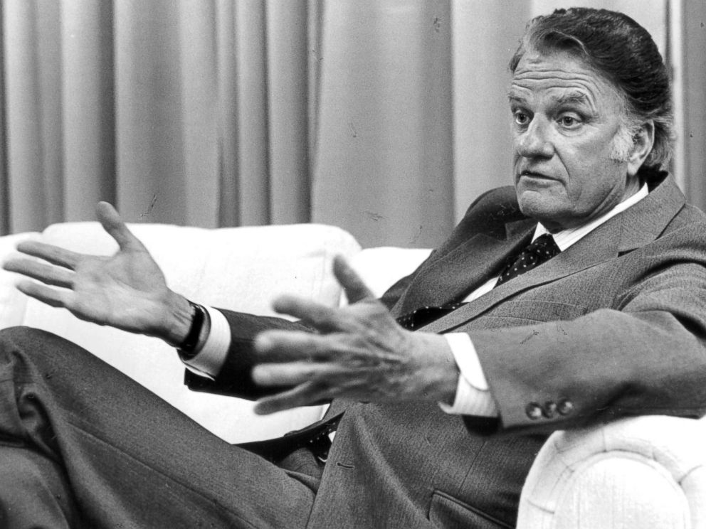 PHOTO: Billy Graham is being interviewed in the Mile High Stadium, July 1, 1987, in Denver.