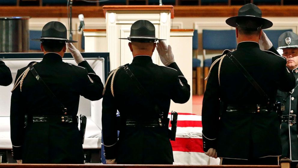 PHOTO:Members of the Biloxi Police Department Honor Guard salute the body of officer Robert McKeithen at the First Baptist Church of Biloxi, Miss., May 13, 2019.